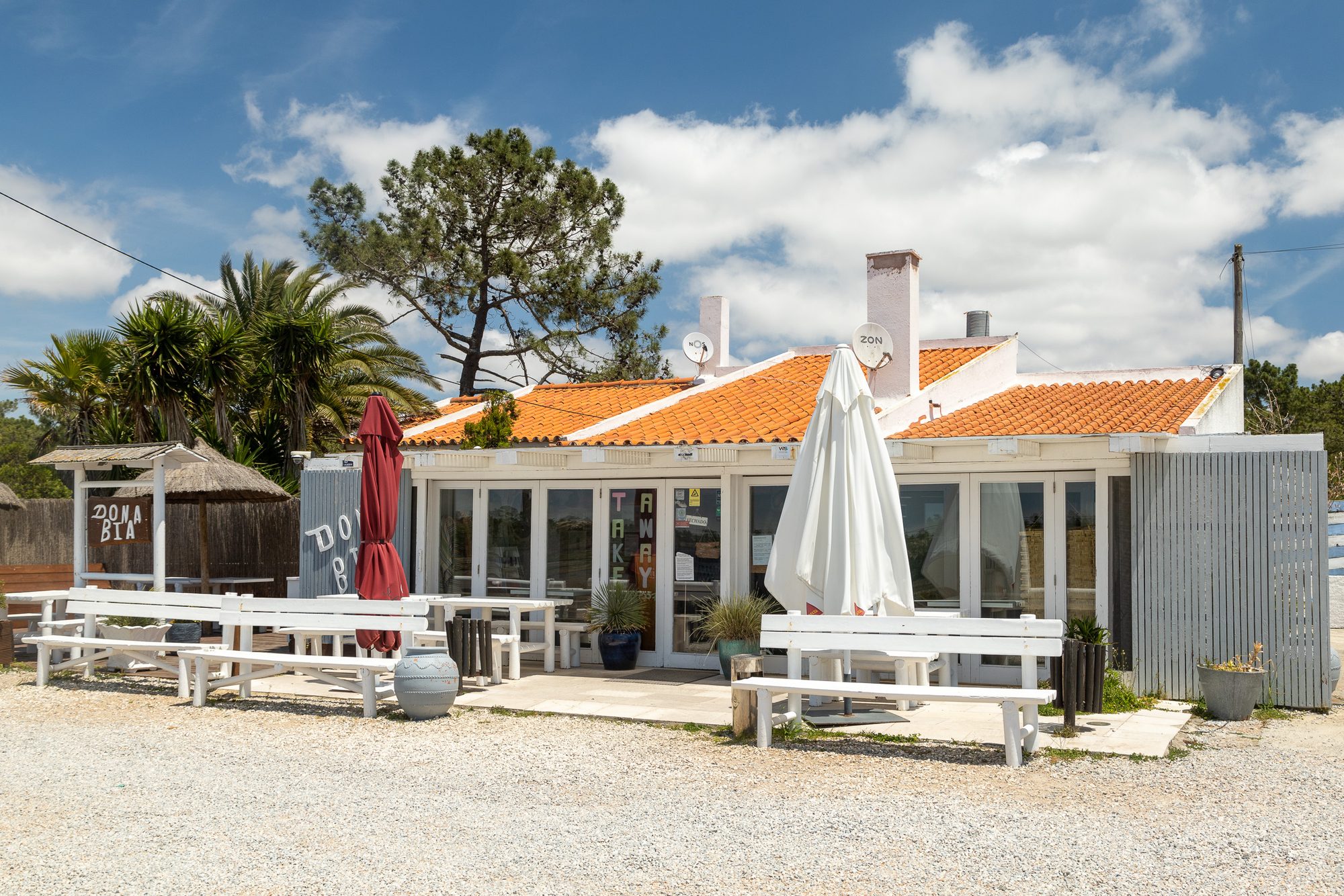 The exterior view of the traditional restaurant Dona Bia on a country road near Comporta.